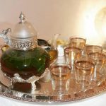 Théière transparente en verre et argent